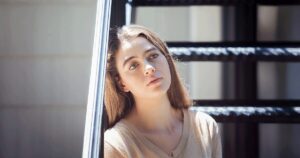 Worried young woman thinking about an incomplete abortion